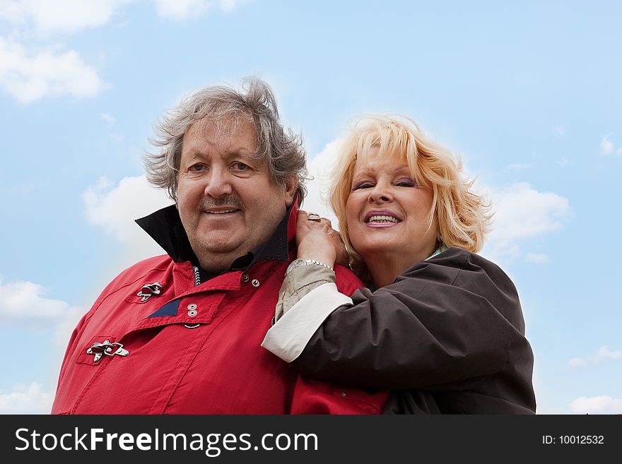 Senior woman hugging her husband isolated on white. Senior woman hugging her husband isolated on white