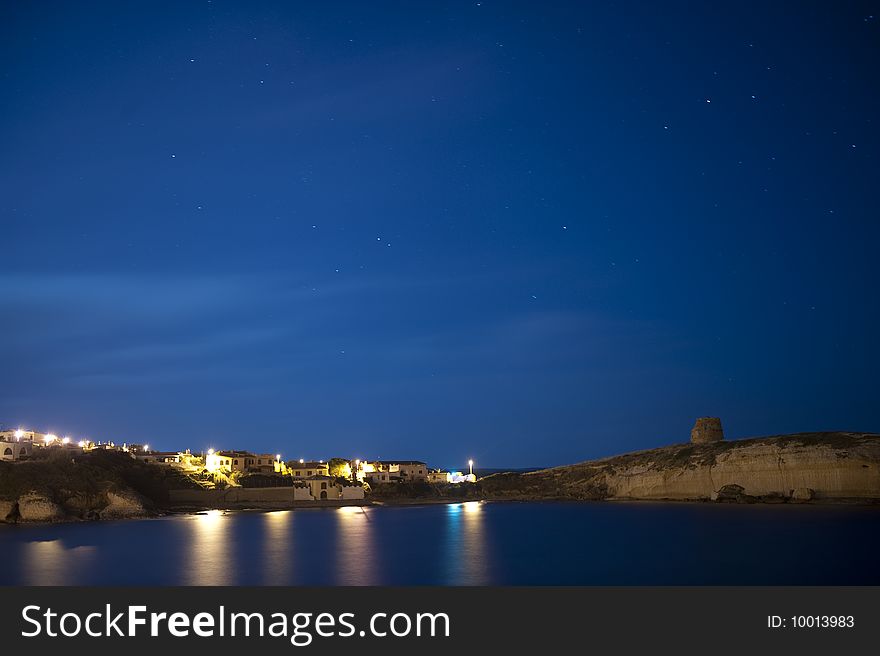 Nocturnal view of a small village in a mediterranean island. Nocturnal view of a small village in a mediterranean island