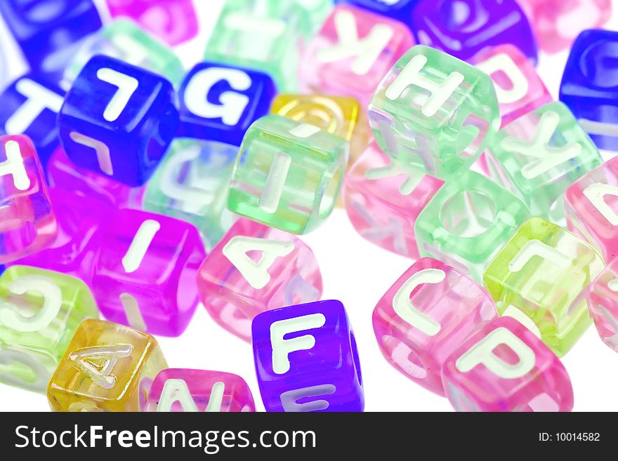 Abstract colourful alphabet blocks to background