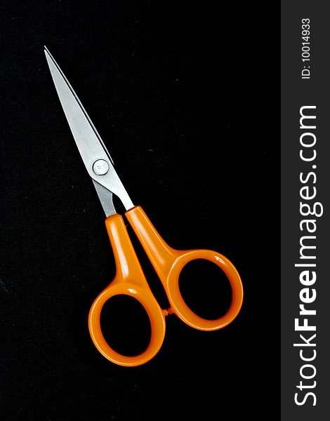 Orange cloth scissor to use homework. Orange cloth scissor to use homework