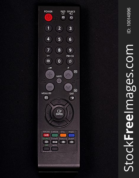 Black remote control on black background