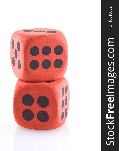 Close up of two dice on a white background. Close up of two dice on a white background.