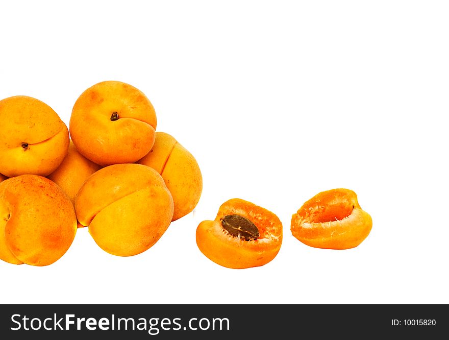 Pile o apricots isolated on white background