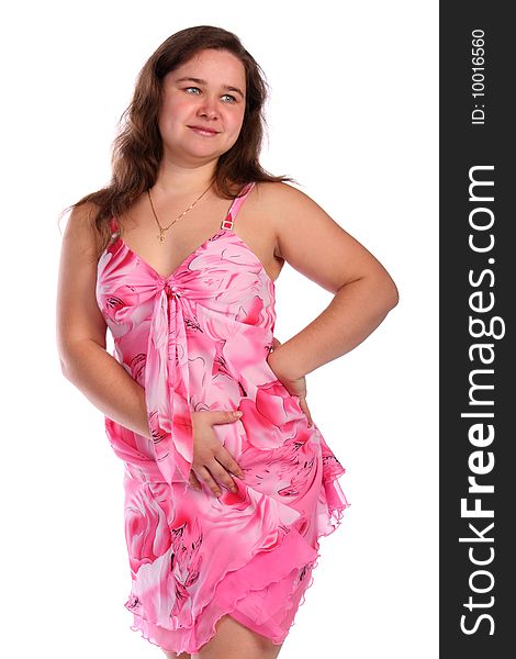 Curly girl in pink dress posing isolated