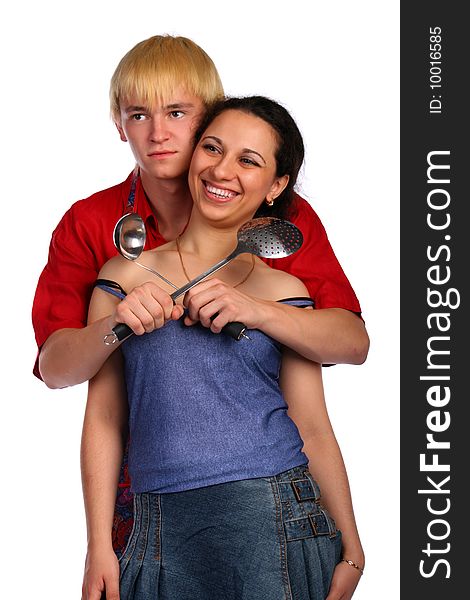 Young Man And Woman Embraces With Utensil