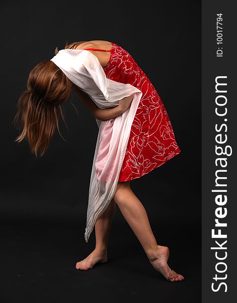 Tired young woman in red-white outfit. Tired young woman in red-white outfit