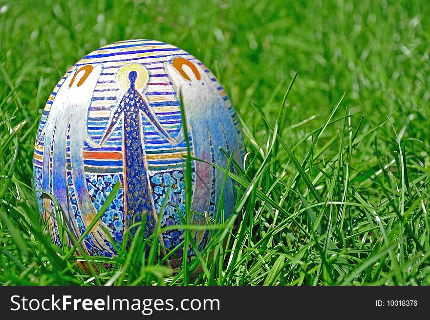 Easter egg in the green grass