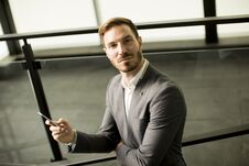 Happy Smiling Urban Businessman Using Smart Phone Outside Stock Photos