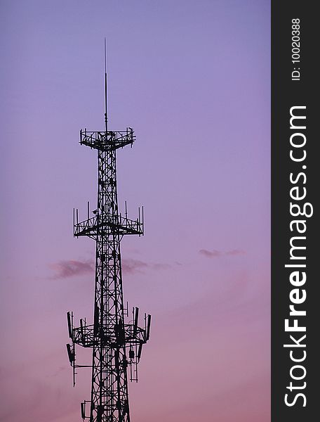 A Base Station Antennas Tower with skies as background