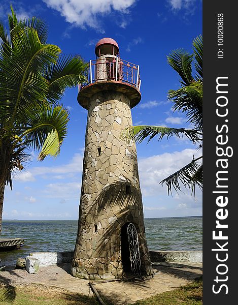 A view of rustic lighthouse on tropical cuban beach. A view of rustic lighthouse on tropical cuban beach
