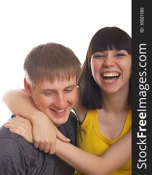 Portrait of young happy pair on a white background. Portrait of young happy pair on a white background