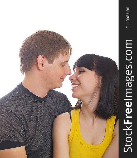 Portrait of young happy pair on a white background. Portrait of young happy pair on a white background