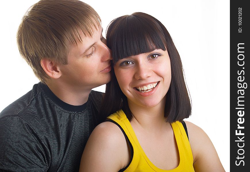 Portrait of young happy pair on a white background. Portrait of young happy pair on a white background