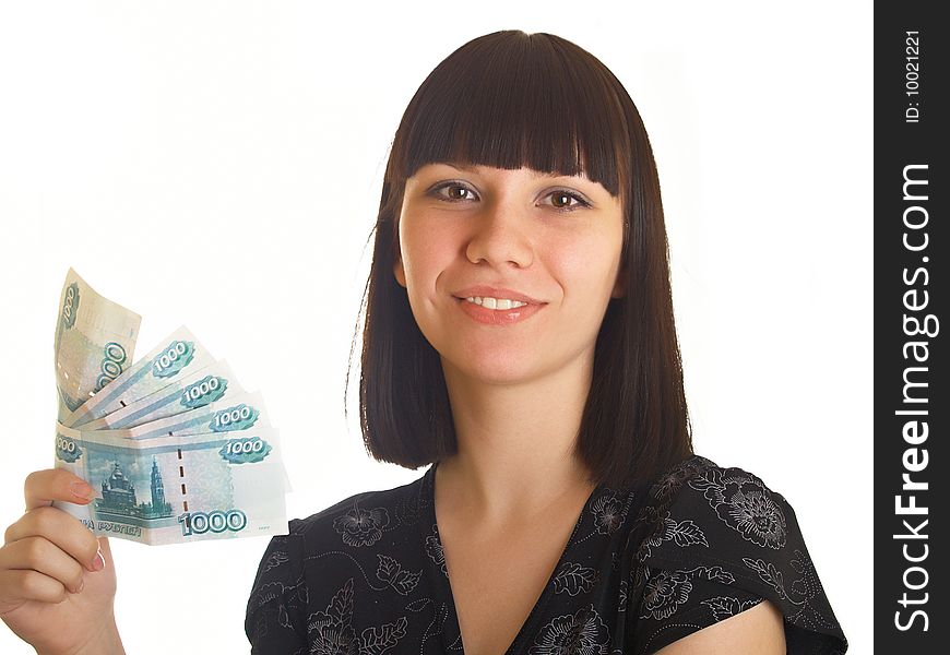 The young girl holds in hands Russian money for a white background. The young girl holds in hands Russian money for a white background