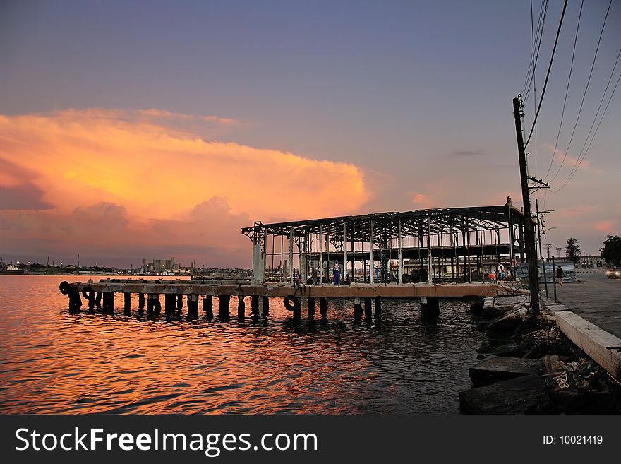A view of abandoned pier in Old havana at dusk. A view of abandoned pier in Old havana at dusk