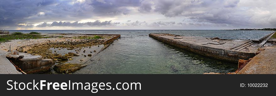 Panoramic view of coast with stormy clouds at sunset, sta Fe beach, cuba. Panoramic view of coast with stormy clouds at sunset, sta Fe beach, cuba