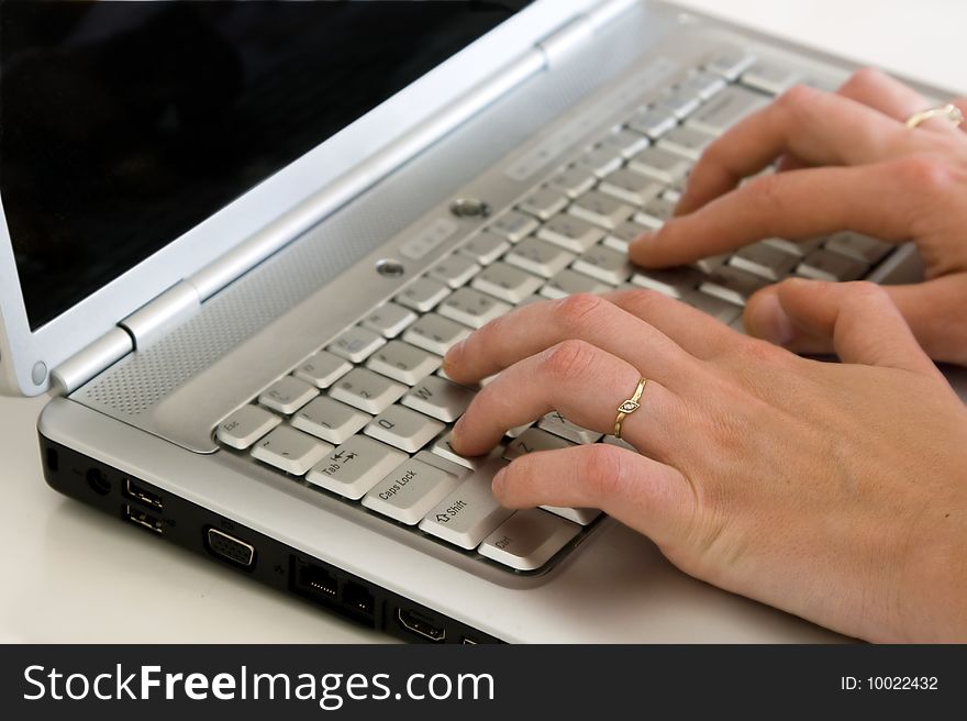 Closeup of a hands typing on the keyboard