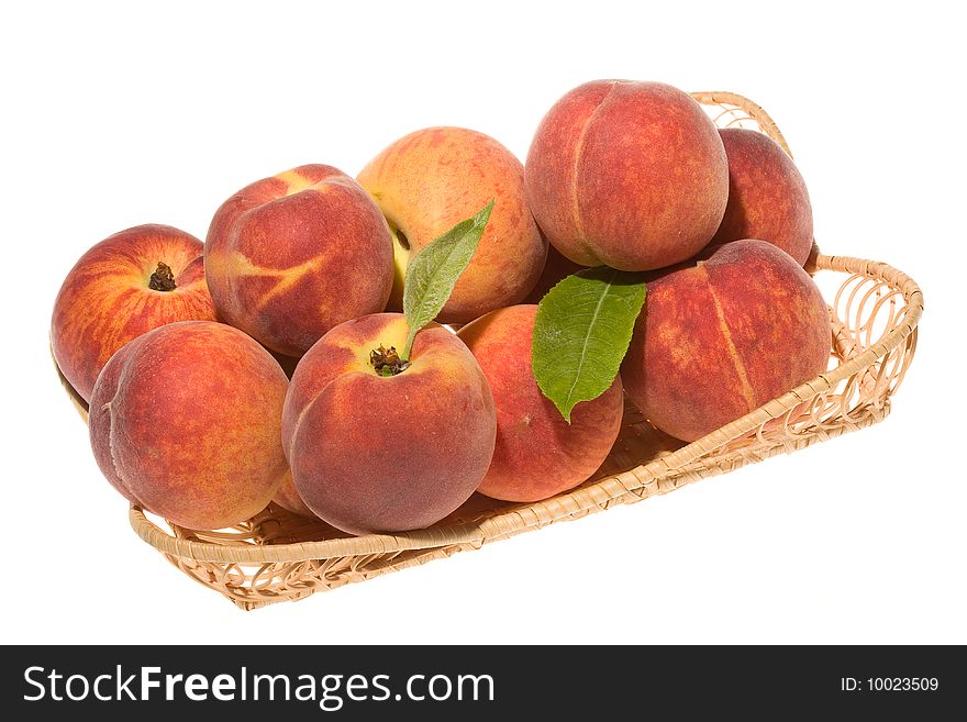 Peaches with leafs on white background