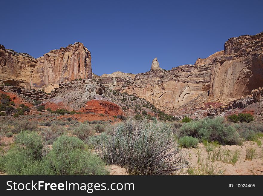 View of red rock formations in San Rafael Swell with blue skyï¿½s