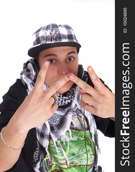 A young DJ is showing a W at the camera. Focus is on the fingers. Isolated over white. A young DJ is showing a W at the camera. Focus is on the fingers. Isolated over white.