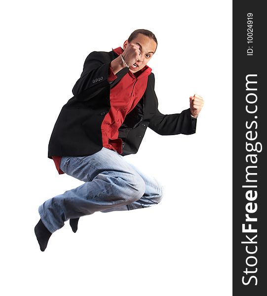 A young businessman with a red shirt - a jacket and blue jeans is jumping in joy. Isolated over white. Slight motion bluriness is intended. A young businessman with a red shirt - a jacket and blue jeans is jumping in joy. Isolated over white. Slight motion bluriness is intended.