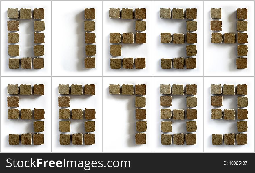 Set of digits of ceramic tiles on white background. Set of digits of ceramic tiles on white background
