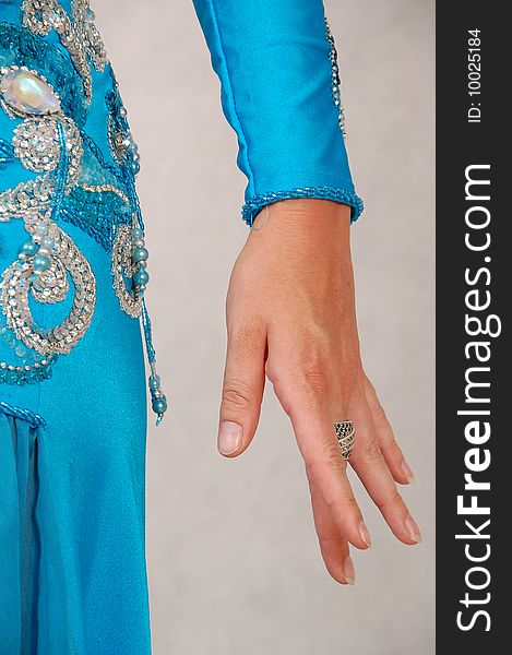 Belly-dancer in traditional turquoise blue attire. Belly-dancer in traditional turquoise blue attire