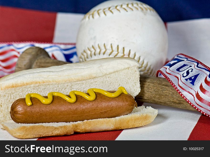 Bat, ball and hotdog on flag. Bat, ball and hotdog on flag.