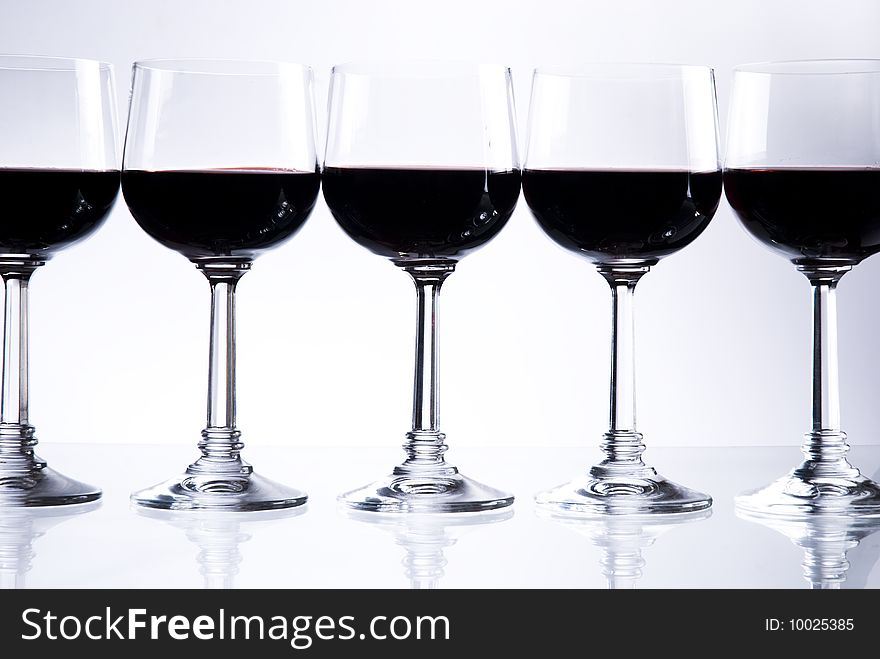 Five glasses of red wine or other beverage
