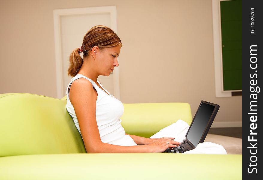 Young Woman Working On A Laptop