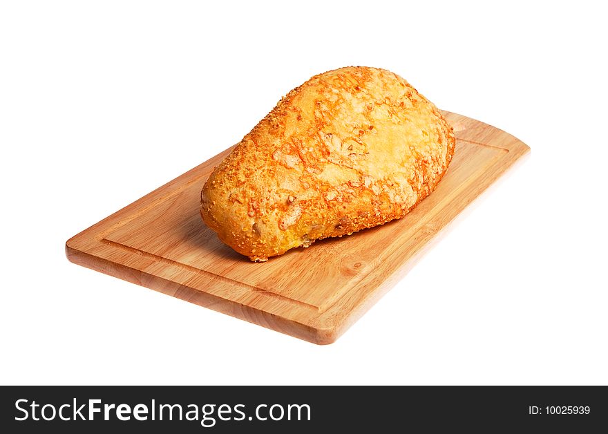 Crusty White Loaf Of Bread On Wooden Board