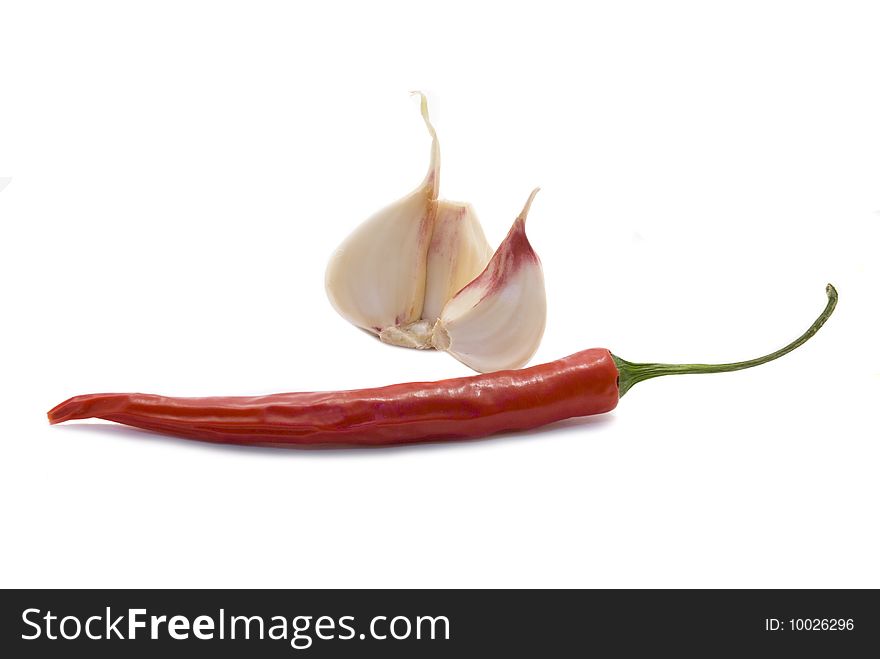 Chilie pepper with garlic isolated on white