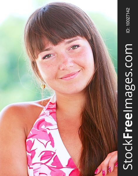 Outdoor portrait of attactive young girl