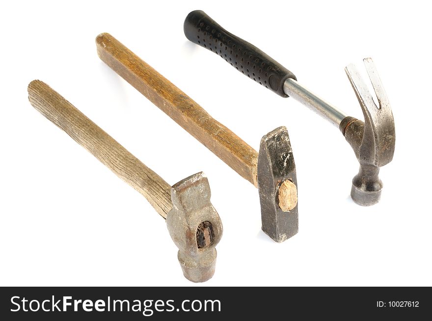 Old hammers on white background.