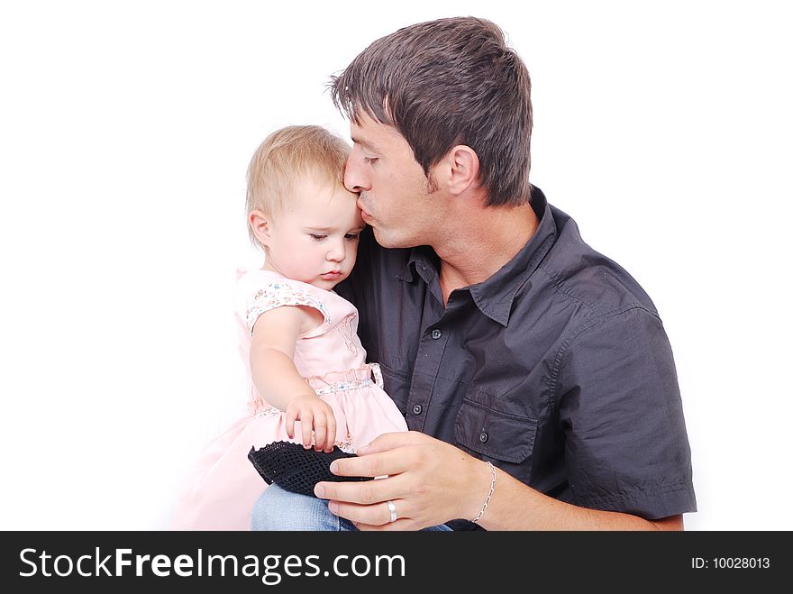 Happy father is kissing his daughter isolated. Happy father is kissing his daughter isolated