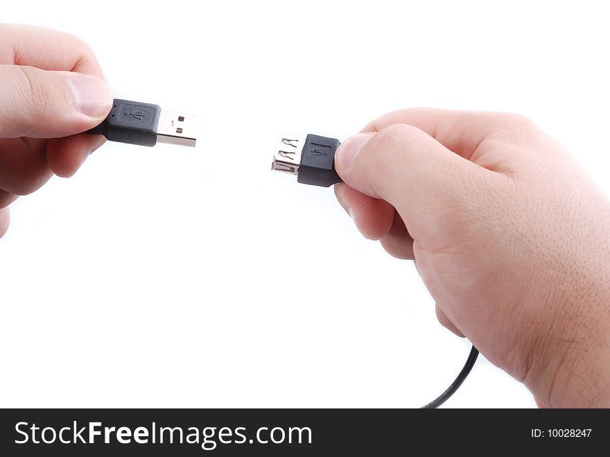 Usb cabel in two mail hands preparing. Usb cabel in two mail hands preparing
