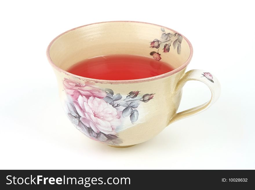 A rose painted up of tea on a white background. A rose painted up of tea on a white background.