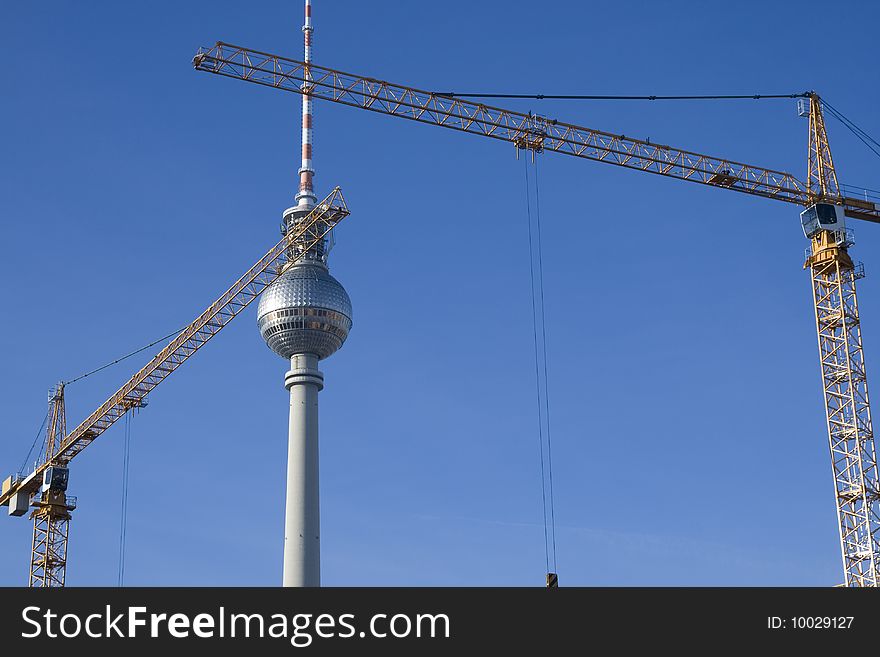 Construction side in Berlin, TV tower in the background.