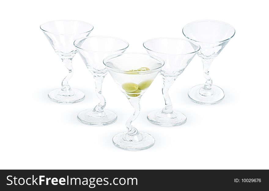 Five glasses of martini and olives