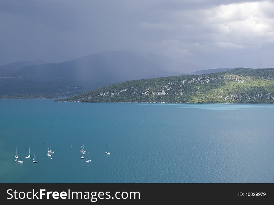 View of the lake of  Serre-PonÃ§on. It  is the second largest artificial dam in Europe. Its reservoir, containing 1.2 thousand million cubic metres of water and covering 2,800 hectares, supplies 16 hydroelectric power stations