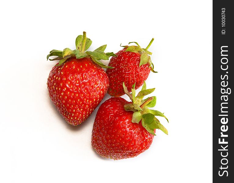 Strawberries isolated over white background