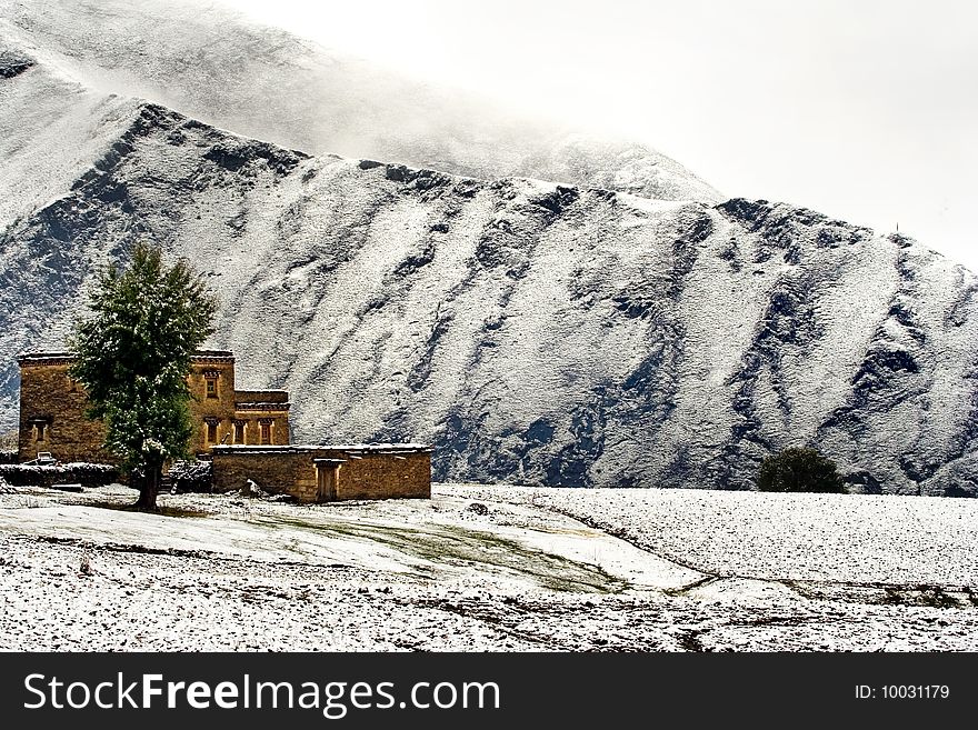 Snow view of tibetan village at Shangri-la China