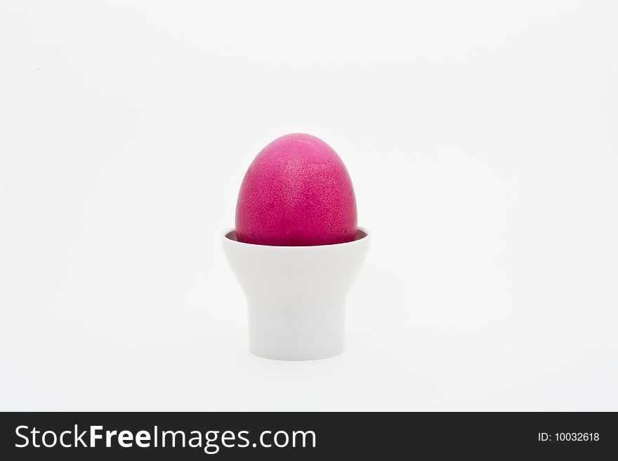 A red egg on a bulb socket