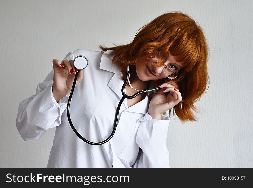 Female Doctor Showing Off Her Stethoscope