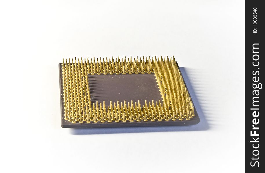 Macro picture overturned CPU on a white background. Macro picture overturned CPU on a white background