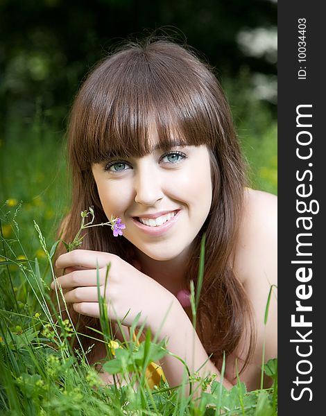 Beautiful woman relaxing at park