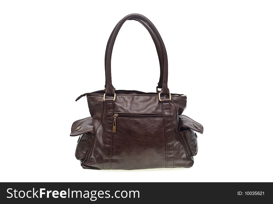 Brown leather bag over white background