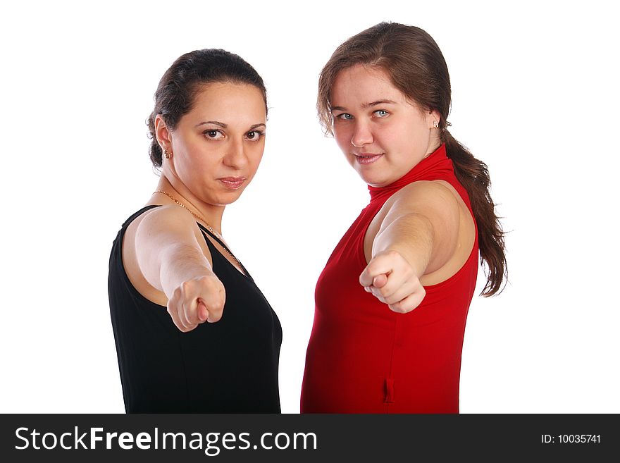 Two girls in dresses gives gesture