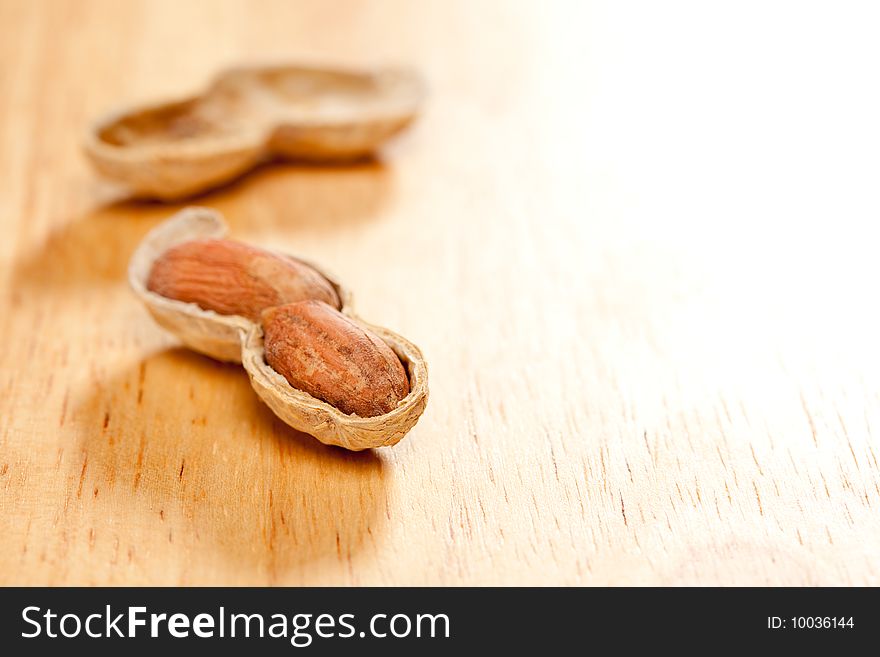 Peanuts On Wood Background