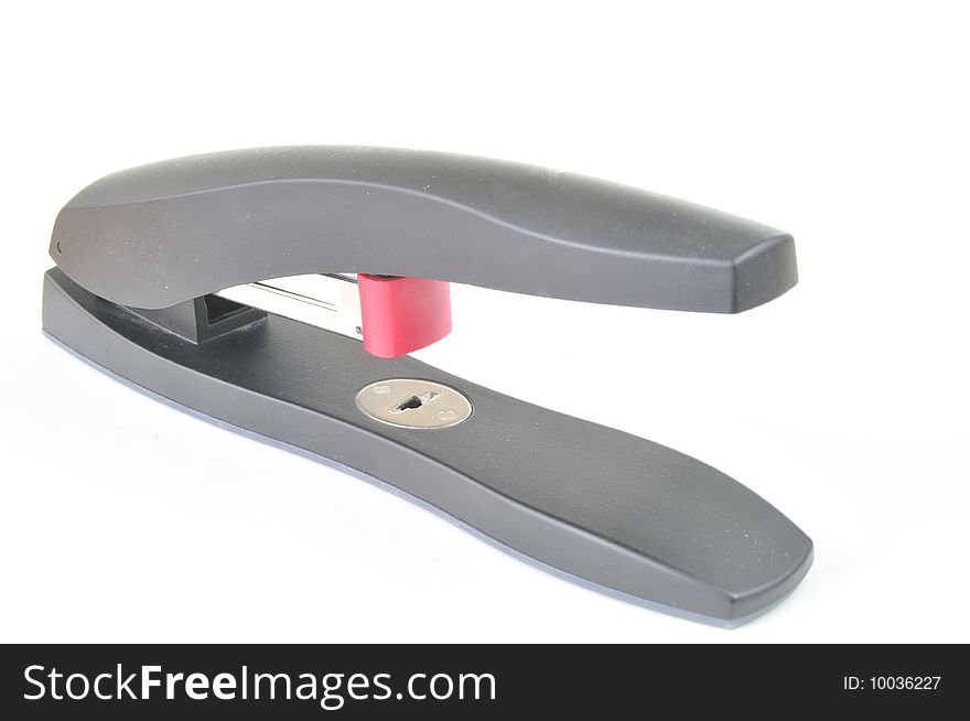 An isolated image of a heavy-duty stapler. An isolated image of a heavy-duty stapler